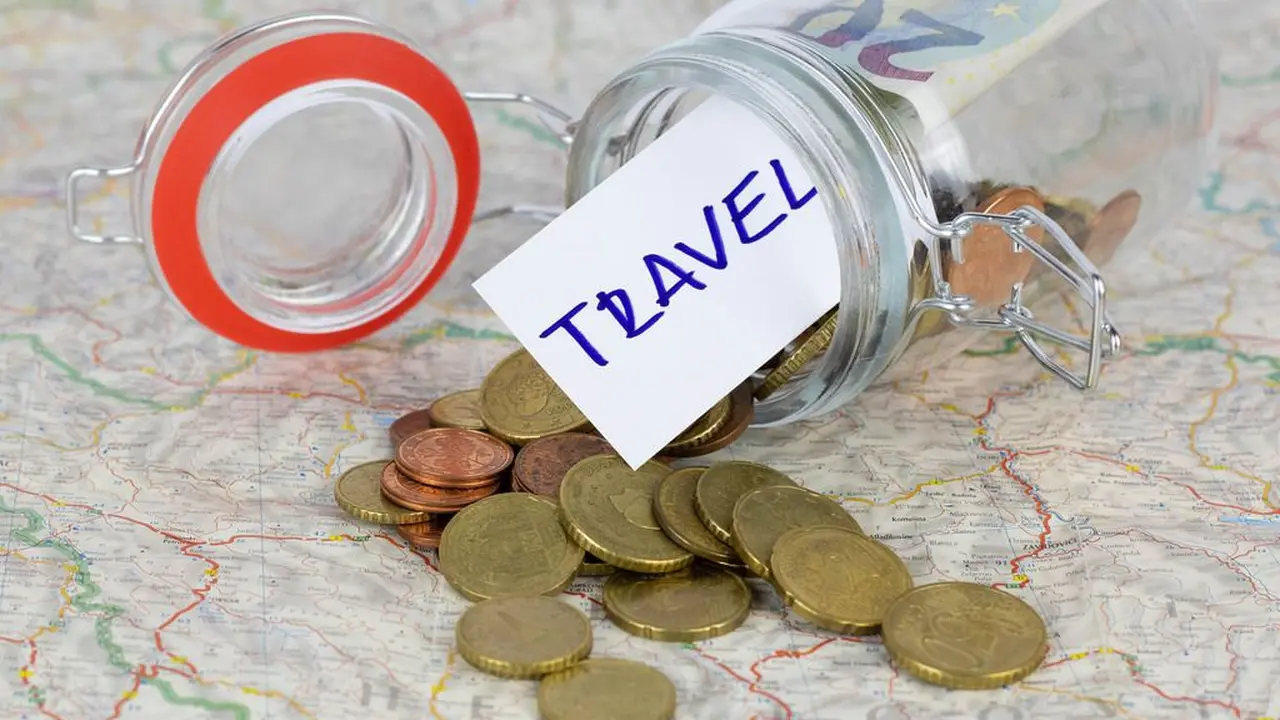 Close up on a plate of mashed potatoes, topped with baked pork chops with cream of mushroom soup, and a side of green beans.