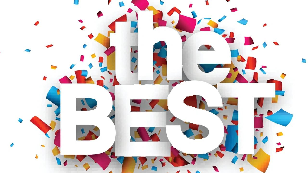 Close up on a plate of mashed potatoes, topped with baked pork chops with cream of mushroom soup, and a side of green beans.